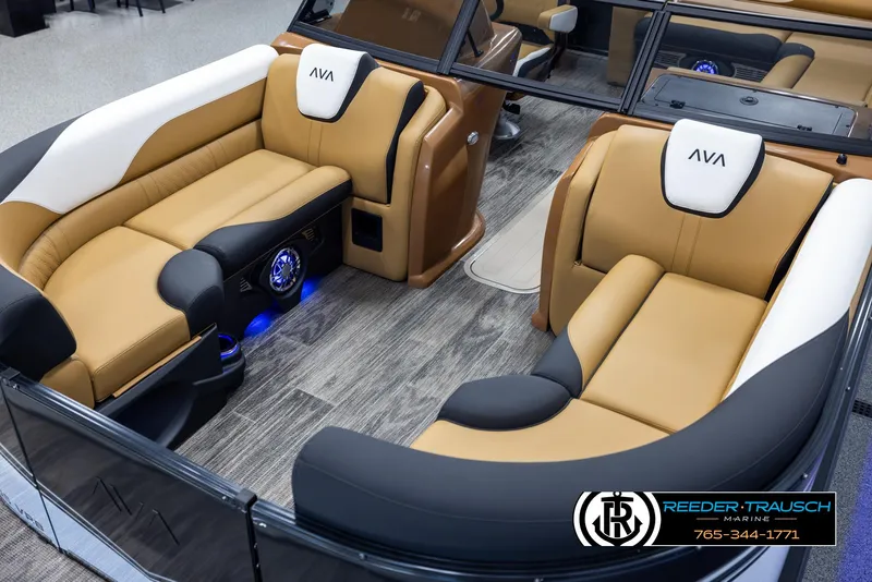Slide: The Image of Luxurious 2025 Avalon LSZ VRB boat interior with tan and black seating, wood flooring. - 10