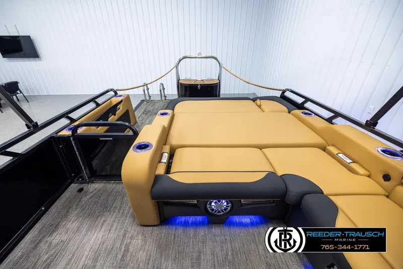Slide: The Image of 2025 Avalon LSZ VRB pontoon boat interior with luxurious seating and ambient lighting. - 17