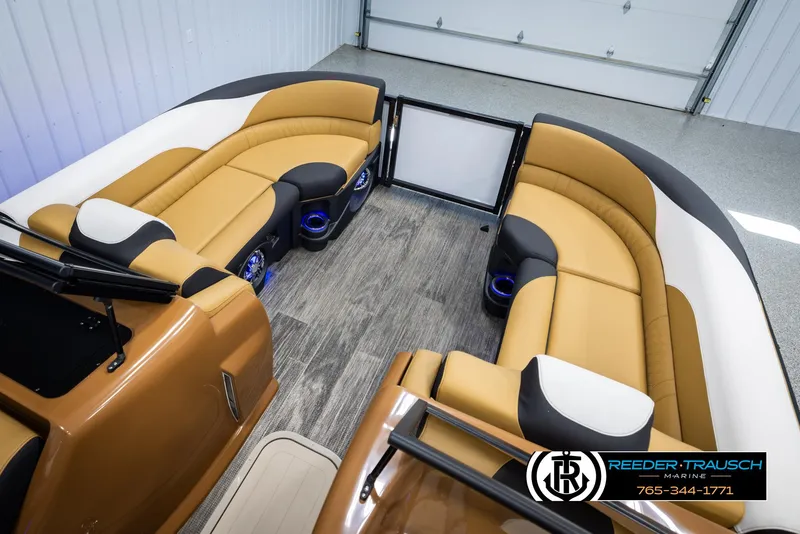 Slide: The Image of 2025 Avalon LSZ VRB boat interior with tan and black seating, modern design. - 22