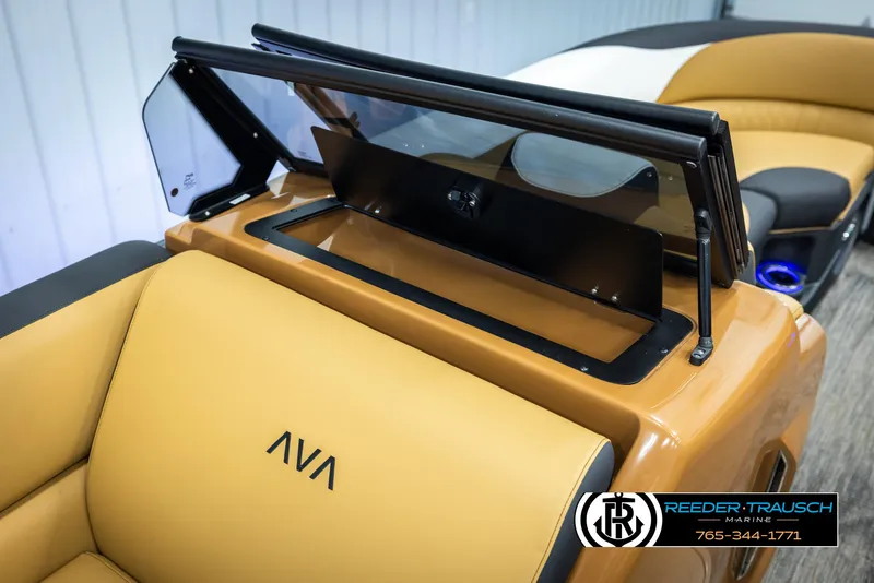 Slide: The Image of 2025 Avalon LSZ VRB boat interior with tan seating and sleek design. - 27