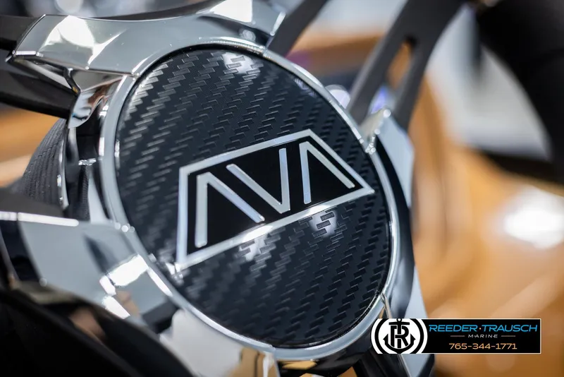 Slide: The Image of Close-up of 2025 Avalon LSZ VRB steering wheel with carbon fiber design. - 30
