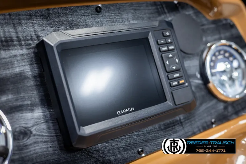 Slide: The Image of Garmin display on 2025 Avalon LSZ VRB dashboard with wood finish. - 33