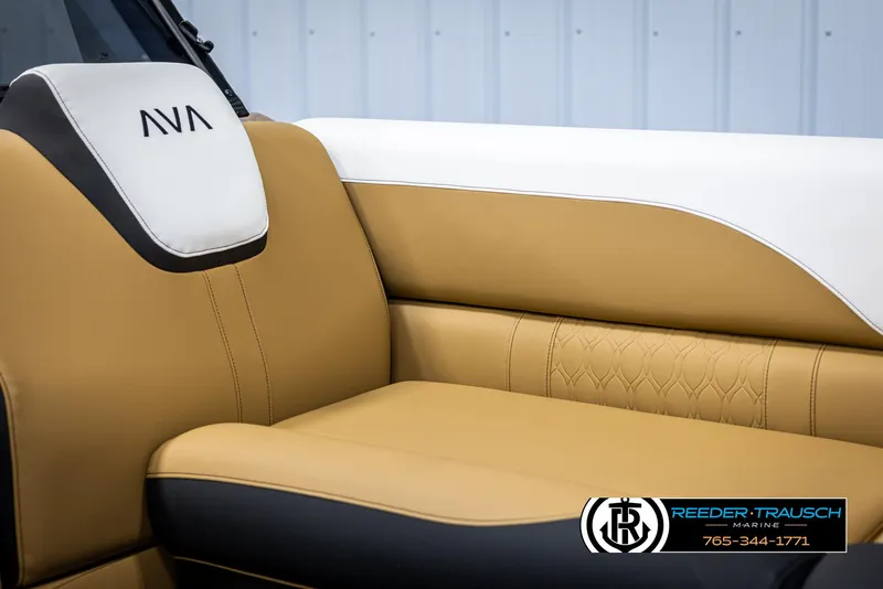 Slide: The Image of 2025 Avalon LSZ VRB boat seat with tan and white upholstery, featuring AVA logo. - 37