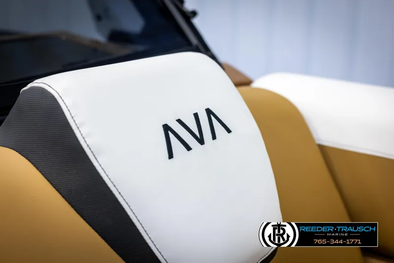 Slide: The Image of Avalon LSZ VRB 2025 boat seat with logo, featuring tan and white upholstery. - 38