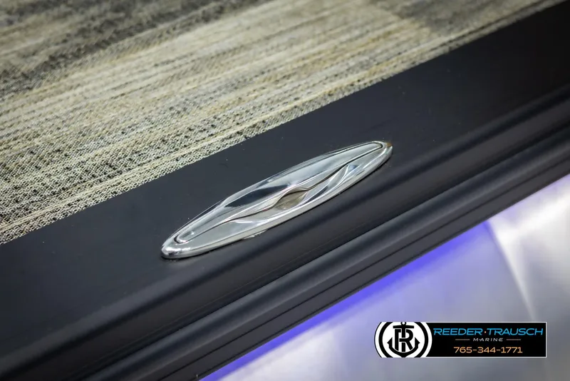 Slide: The Image of 2025 Avalon LSZ VRB logo detail with textured surface and dealership branding. - 49