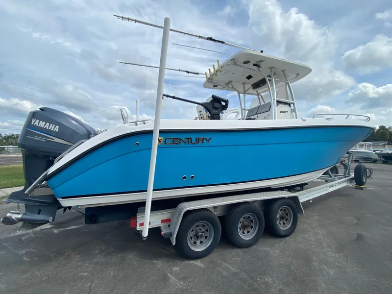 Slide: The Image of 2008 Century 2901 Center Console boat on trailer with Yamaha engine. - 22