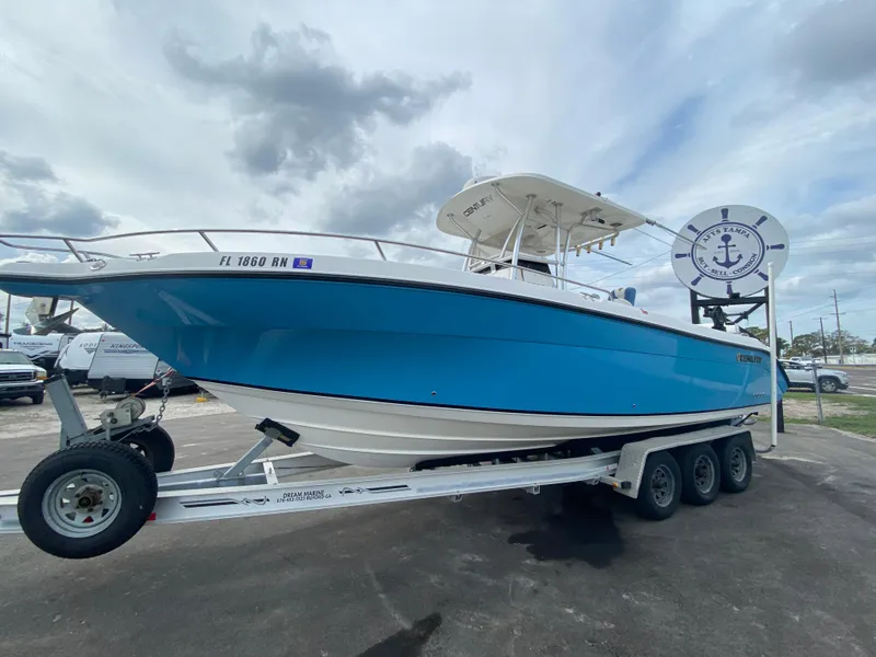 Slide: The Image of 2008 Century 2901 Center Console boat on trailer under cloudy sky. - 30