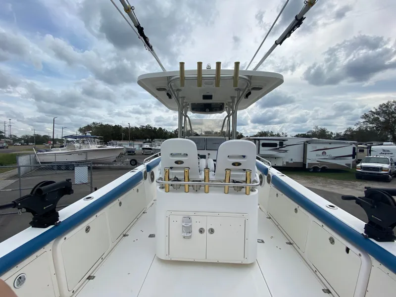 Slide: The Image of 2008 Century 2901 Center Console boat with spacious deck and fishing rod holders. - 34