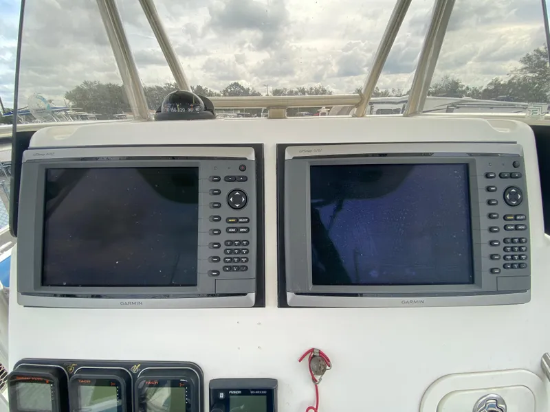 Slide: The Image of 2008 Century 2901 Center Console with dual Garmin displays. - 39