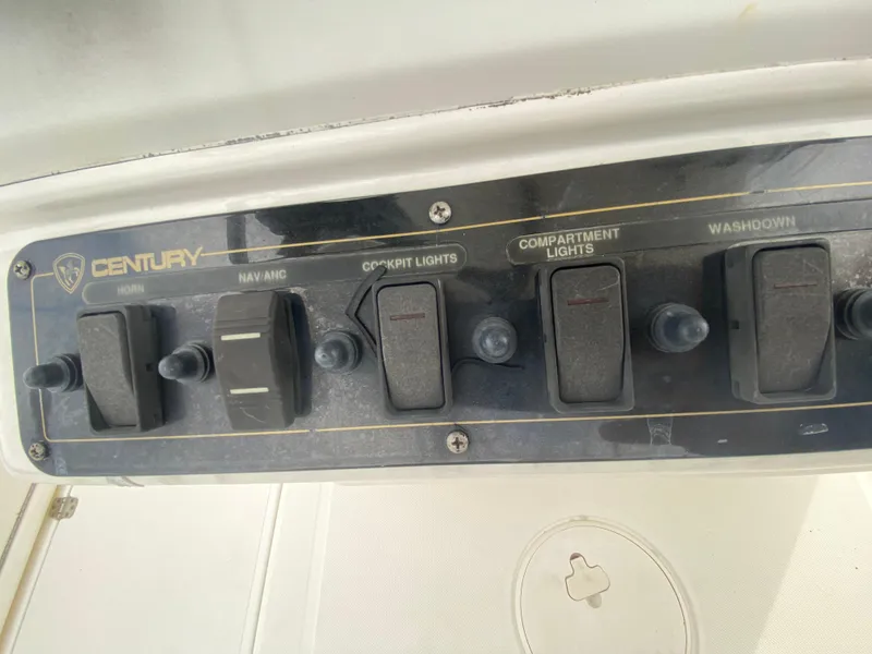 Slide: The Image of Century 2901 Center Console 2008 control panel with various switches. - 43