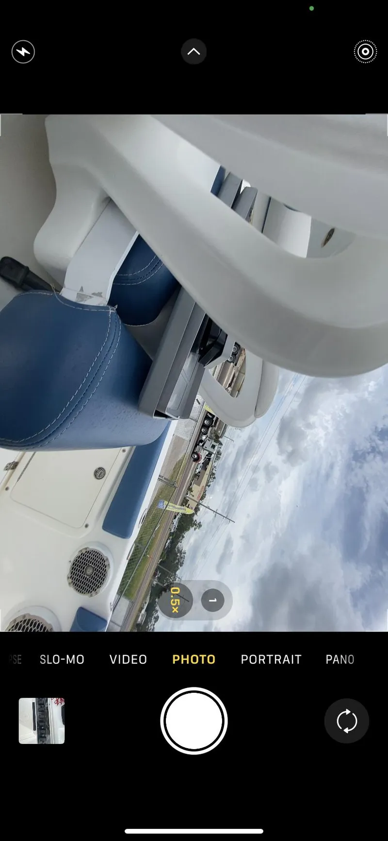 Slide: The Image of 2008 Century 2901 Center Console boat interior with blue and white seating. - 45