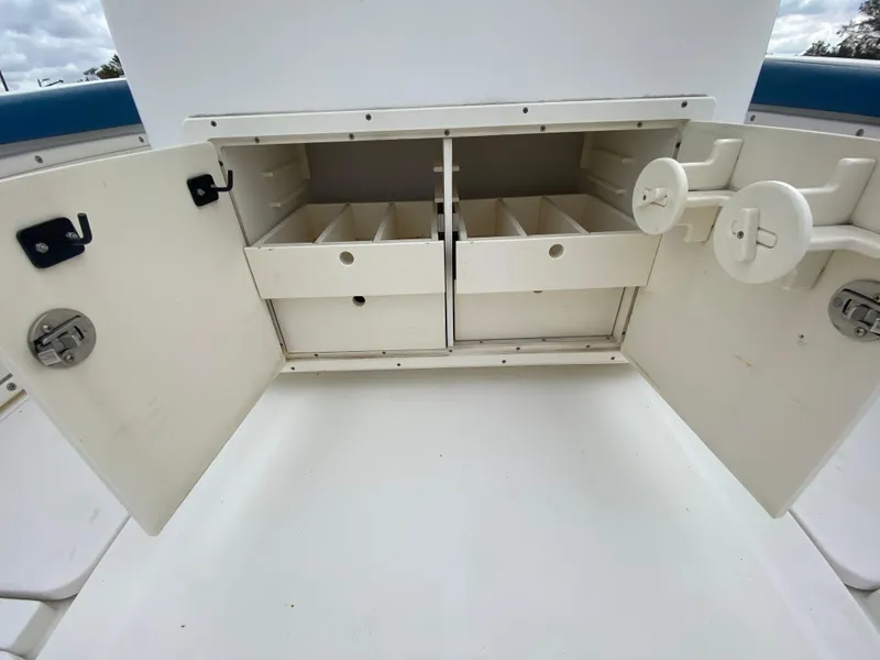 Slide: The Image of Open storage compartment on a 2008 Century 2901 Center Console boat. - 47