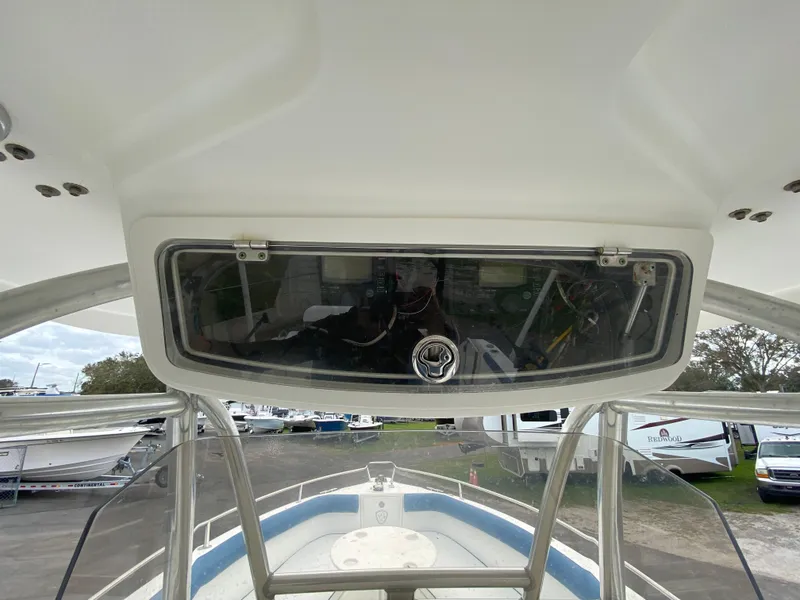 Slide: The Image of 2008 Century 2901 Center Console boat interior view with electronics panel. - 49