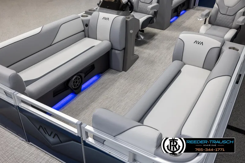 Slide: The Image of 2025 Avalon VEN QL boat interior with gray seating and blue LED lighting. - 10