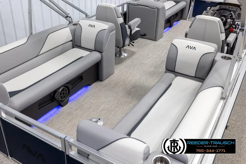 Slide: The Image of 2025 Avalon VEN QL boat interior with gray seating and blue LED lighting. - 12