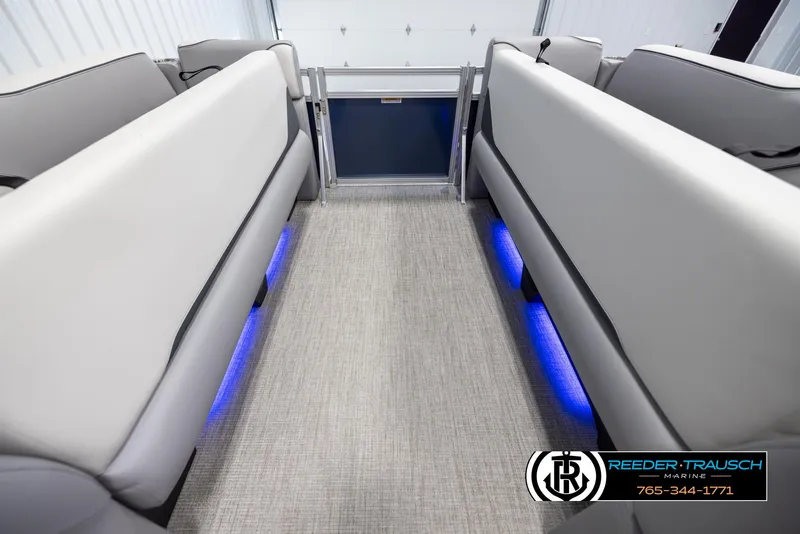 Slide: The Image of 2025 Avalon VEN QL interior with blue LED lighting and gray seating. - 19