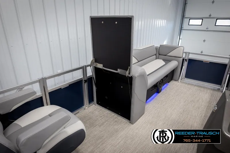 Slide: The Image of Interior of 2025 Avalon VEN QL boat with modern seating and sleek design. - 21