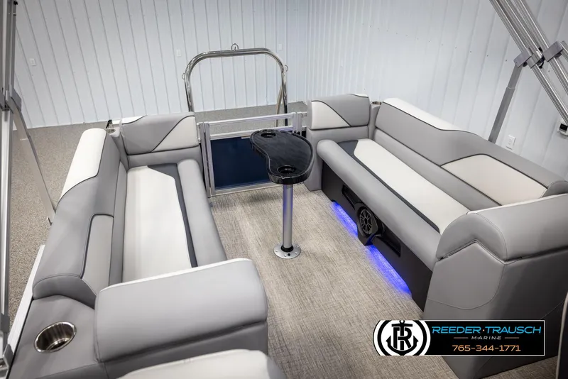 Slide: The Image of Luxurious 2025 Avalon VEN QL boat interior with plush seating and ambient lighting. - 23
