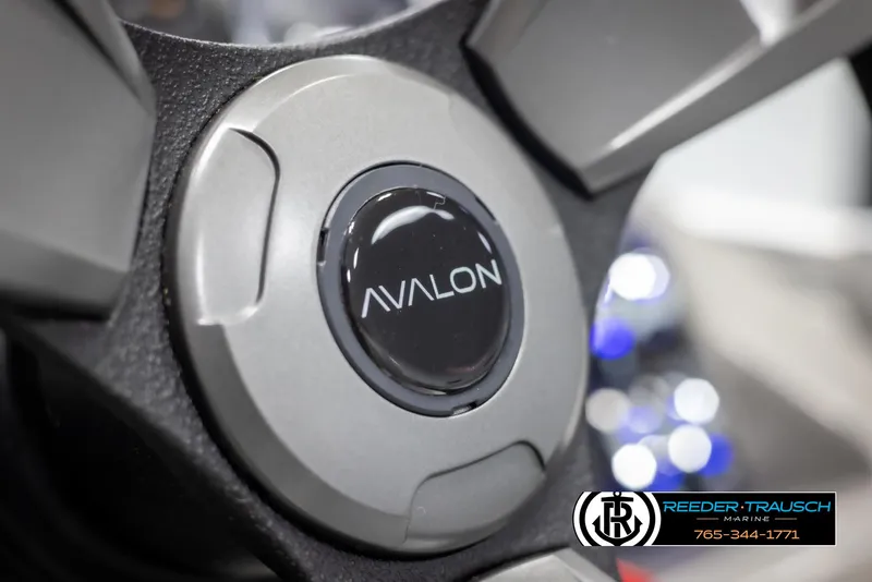Slide: The Image of Close-up of 2025 Avalon VEN QL steering wheel with logo. - 27