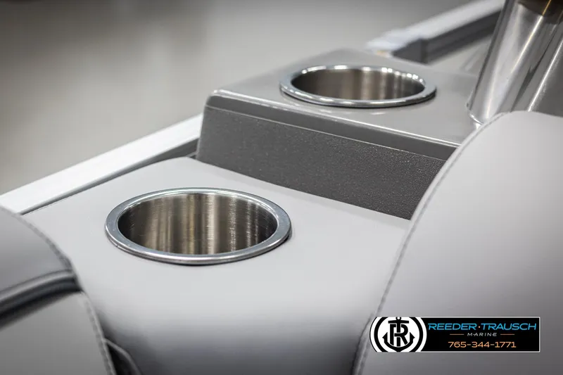 Slide: The Image of 2025 Avalon VEN QL boat cup holders, sleek design, Reeder-Trausch Marine branding. - 36