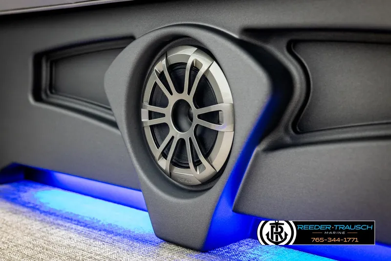 Slide: The Image of 2025 Avalon VEN QL speaker with blue LED lighting and Reeder-Trausch branding. - 38