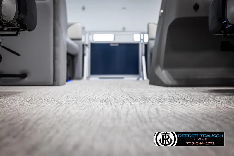 Slide: The Image of Interior view of 2025 Avalon VEN QL, showcasing carpeted flooring and seating arrangement. - 39