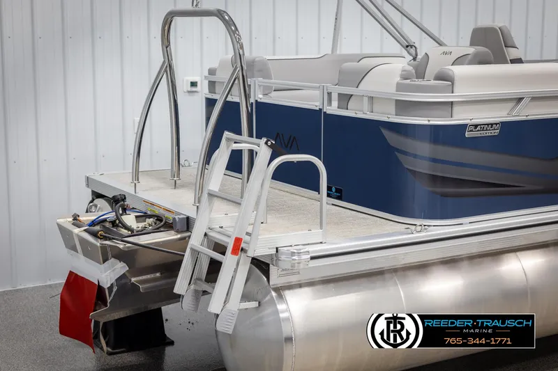 Slide: The Image of Avalon VEN QL 2025 pontoon boat with ladder and seating, displayed indoors. - 40