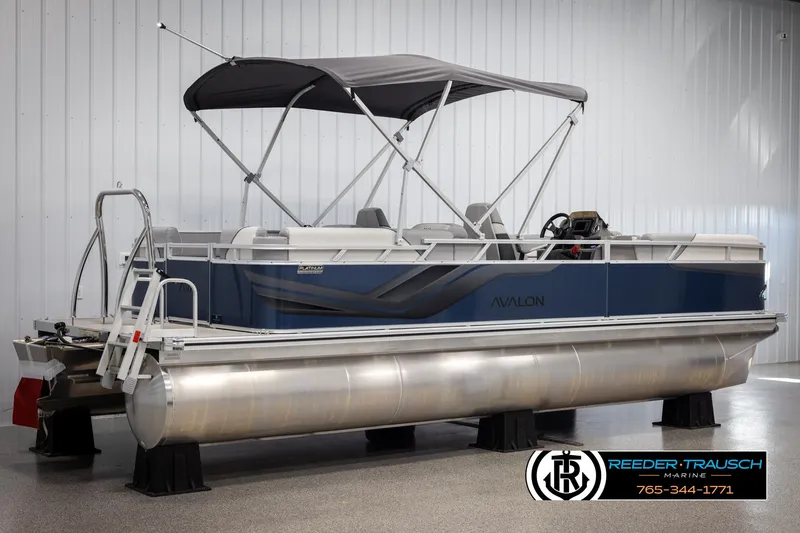 Slide: The Image of 2025 Avalon VEN QL pontoon boat with canopy in showroom. - 5