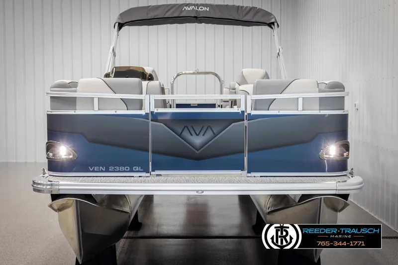 Slide: The Image of 2025 Avalon VEN QL pontoon boat, rear view, in showroom setting. - 8