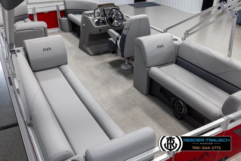 Slide: The Image of 2025 Avalon VLS QL pontoon boat interior with gray seating and modern dashboard. - 11