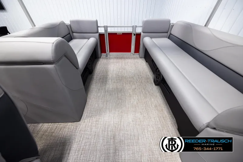 Slide: The Image of 2025 Avalon VLS QL boat interior with gray seating and carpet flooring. - 15