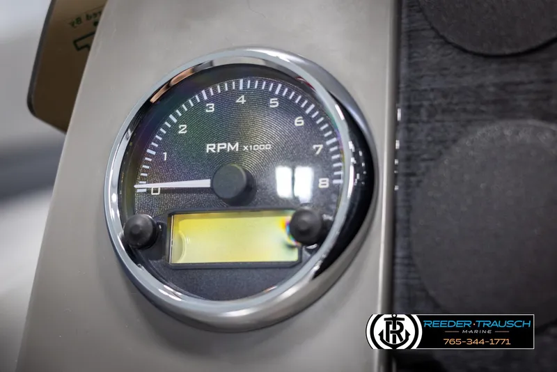 Slide: The Image of Close-up of 2025 Avalon VLS QL RPM gauge with Reeder-Trausch branding. - 28