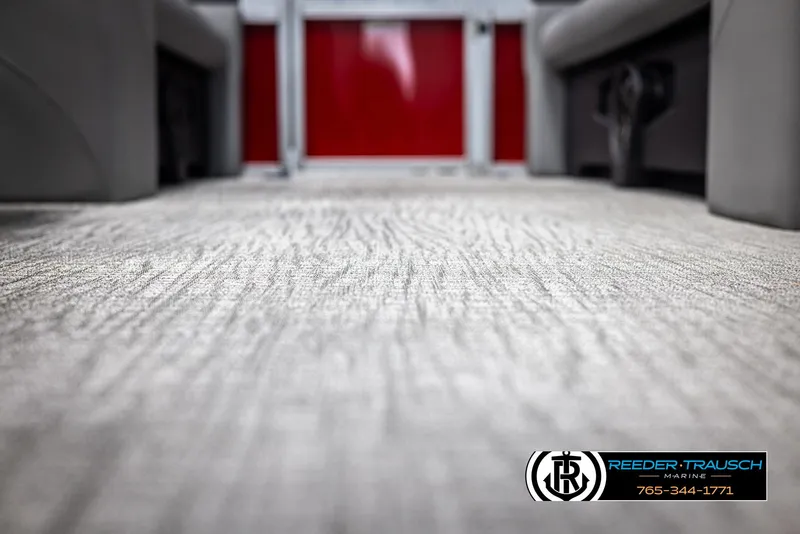 Slide: The Image of Carpeted interior of 2025 Avalon VLS QL boat, featuring modern design and comfort. - 39