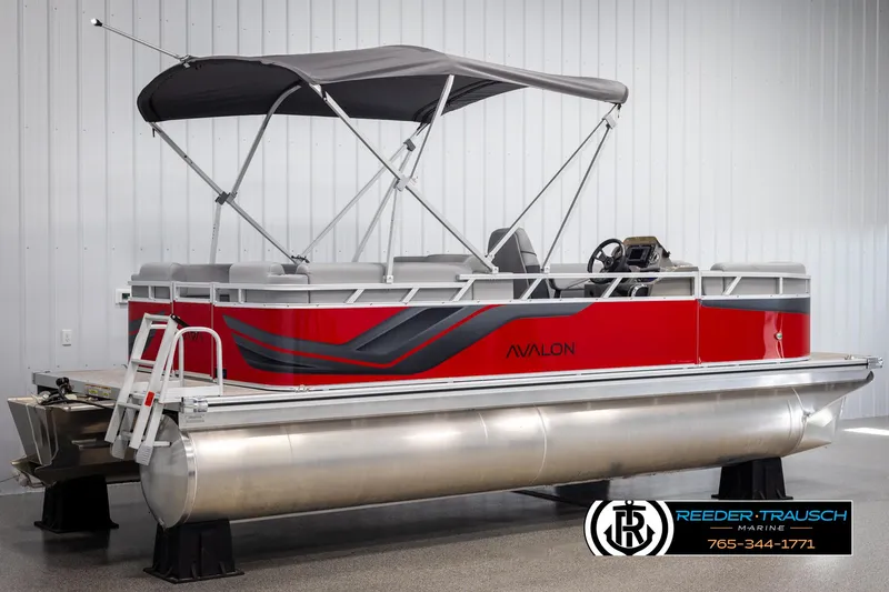 Slide: The Image of 2025 Avalon VLS QL pontoon boat with canopy in showroom. - 6