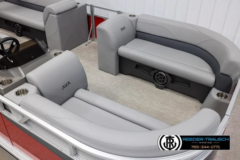 Slide: The Image of 2025 Avalon VLS QL boat interior with gray seating and cup holders. - 9