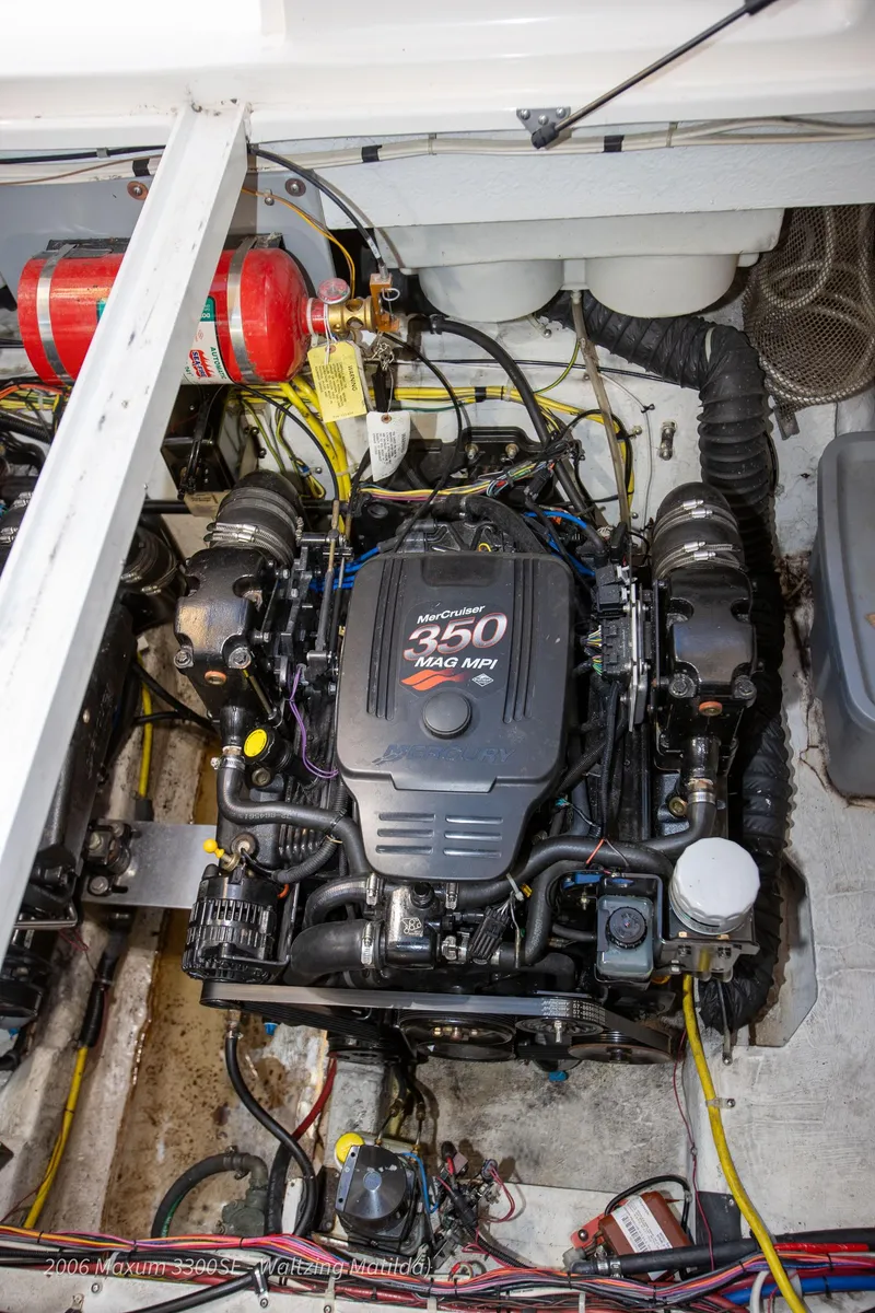 Slide: The Image of 2006 Maxum 3300 SE engine compartment with MerCruiser 350 MAG MPI engine. - 33