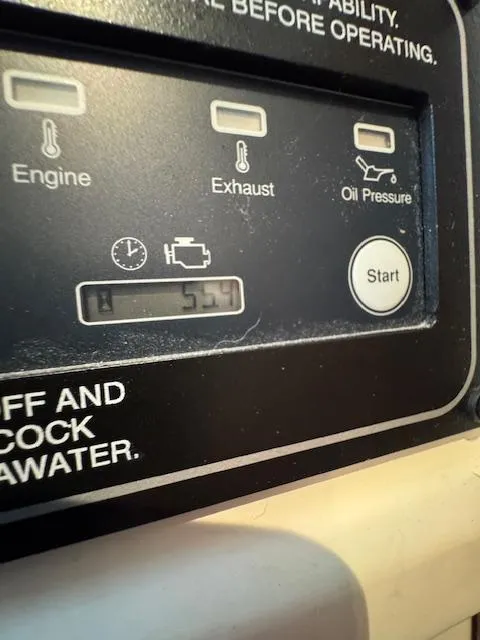 Slide: The Image of Control panel of 2023 Grady-White Freedom 335 boat, displaying engine, exhaust, and oil pressure indicators. - 22