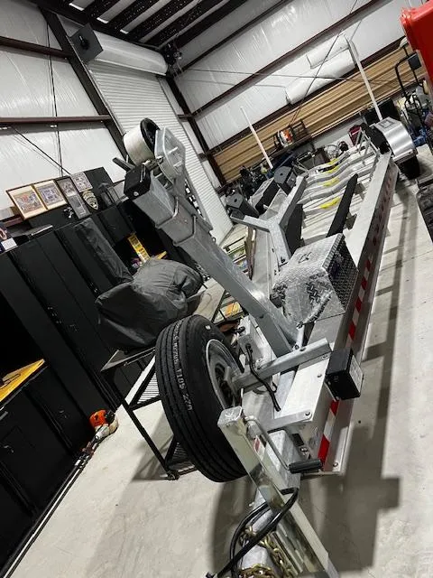Slide: The Image of 2023 Grady-White Freedom 335 boat trailer in a storage facility. - 36