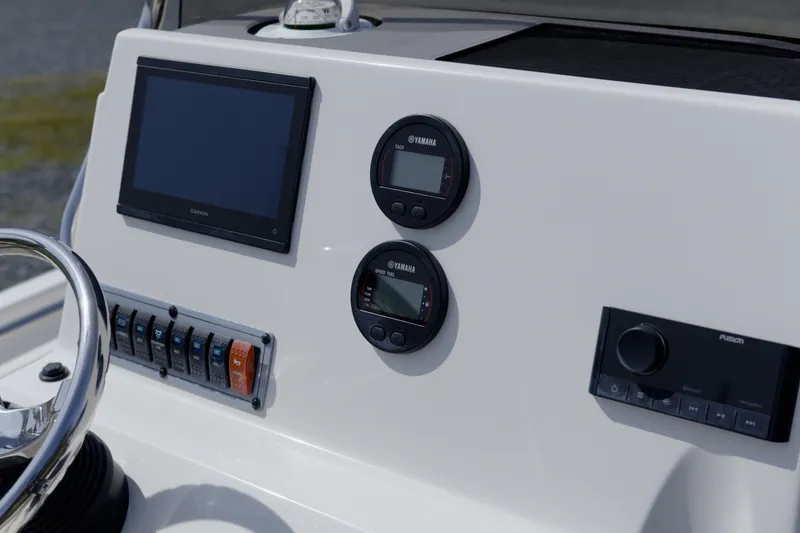 Slide: The Image of Dashboard of 2025 Key West 189 FS boat with Garmin and Yamaha displays. - 11