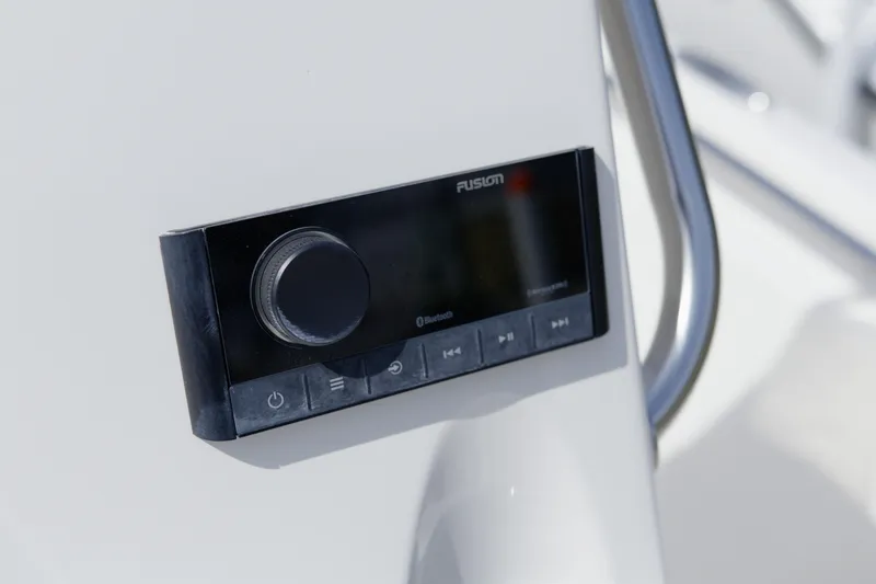 Slide: The Image of Fusion audio system on 2025 Key West 189 FS boat console. - 13