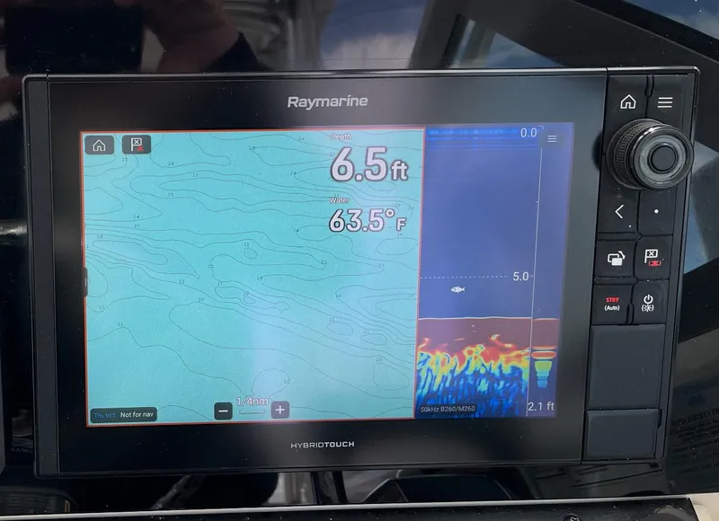 Slide: The Image of Raymarine display showing depth and temperature on a 2005 Pursuit 3070 WA EXPRESS boat. - 9