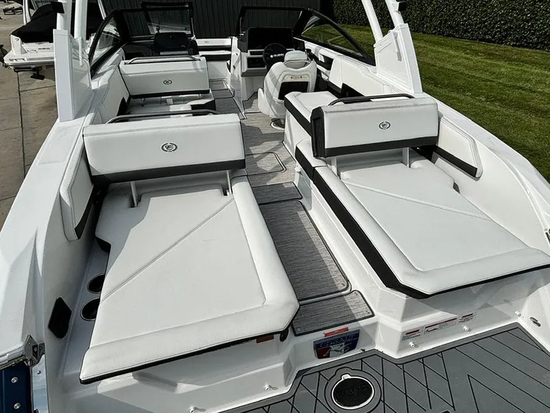 Slide: The Image of 2025 Cobalt R6 Outboard boat with luxurious white seating and modern design. - 10