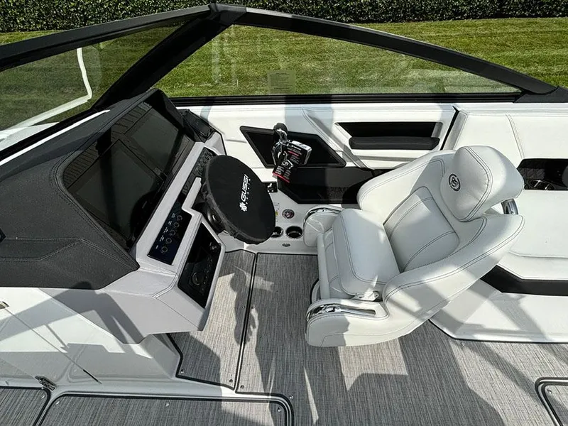 Slide: The Image of 2025 Cobalt R6 Outboard boat interior with modern helm and luxurious seating. - 15