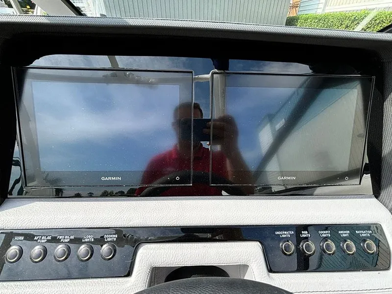 Slide: The Image of Dashboard of 2025 Cobalt R6 Outboard with dual Garmin displays and control buttons. - 17