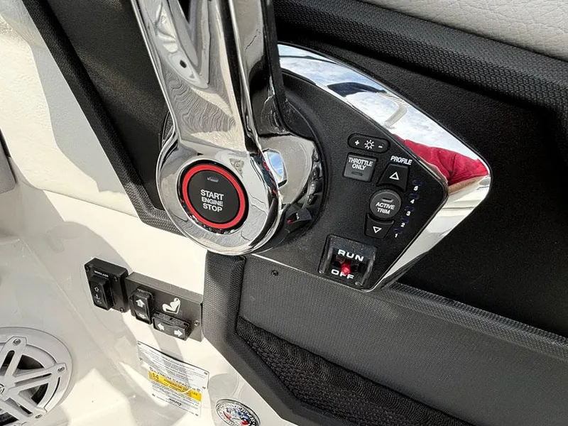 Slide: The Image of Control panel of 2025 Cobalt R6 Outboard boat with start-stop button and switches. - 20