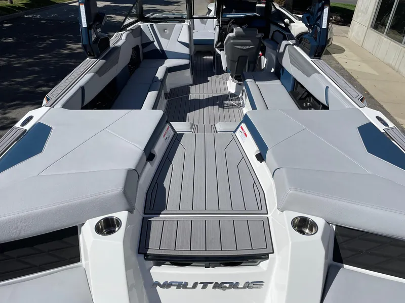 Slide: The Image of 2023 Nautique Super Air Nautique S25 interior with sleek seating and modern design. - 4