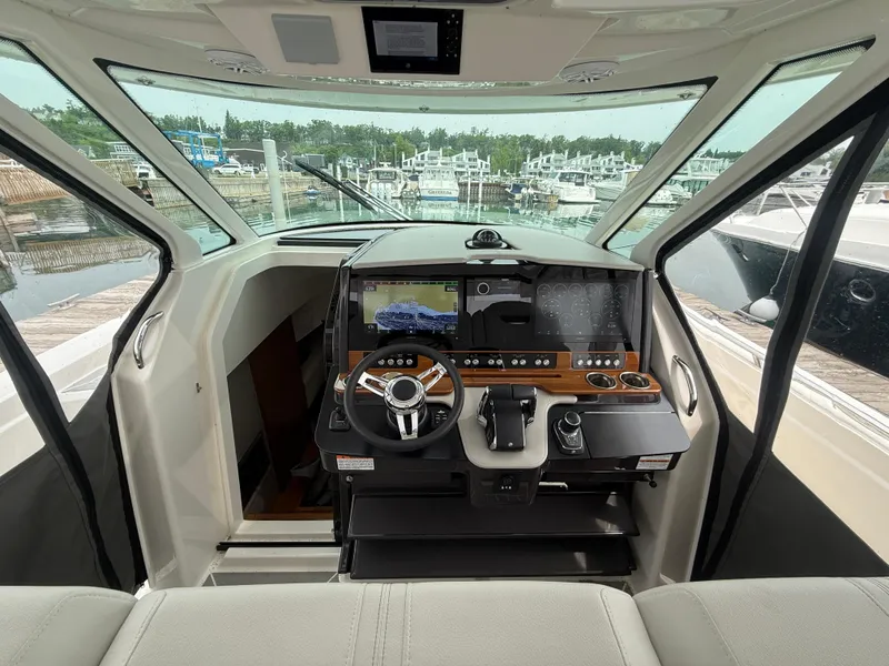 Slide: The Image of Helm w/cabin companionway to port - 28