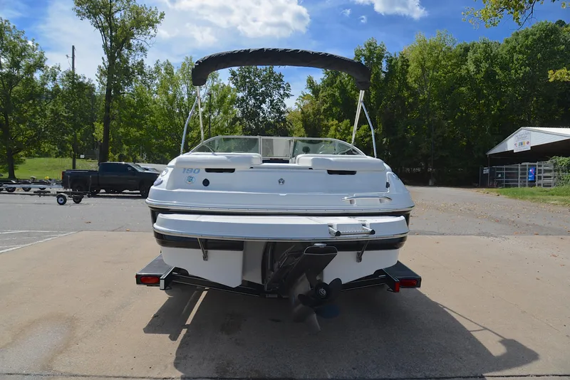 Slide: The Image of 2008 Chaparral 190 SSi boat, rear view, parked outdoors on a sunny day. - 13