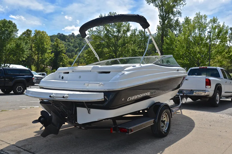 Slide: The Image of 2008 Chaparral 190 SSi boat on trailer, parked outdoors. - 14