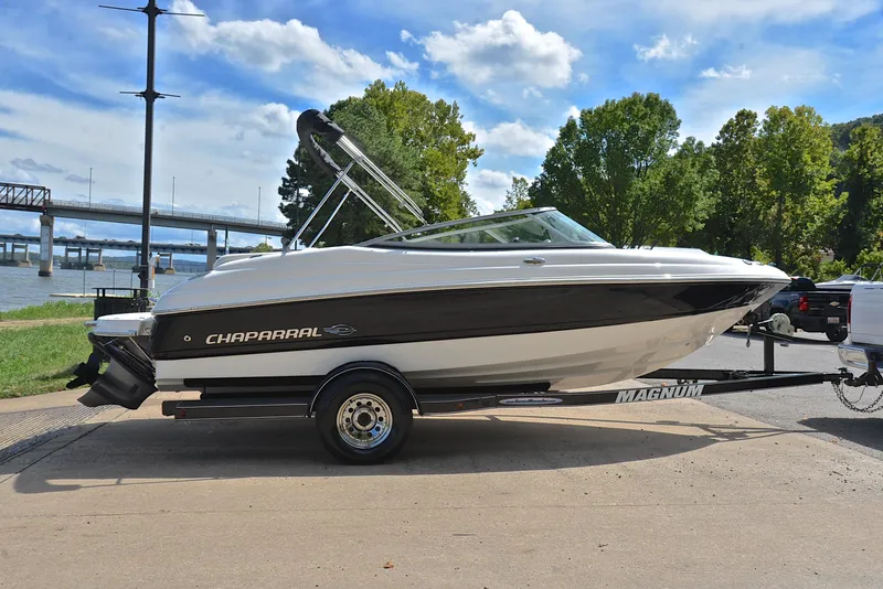 Slide: The Image of 2008 Chaparral 190 SSi boat on trailer by river, sunny day. - 15